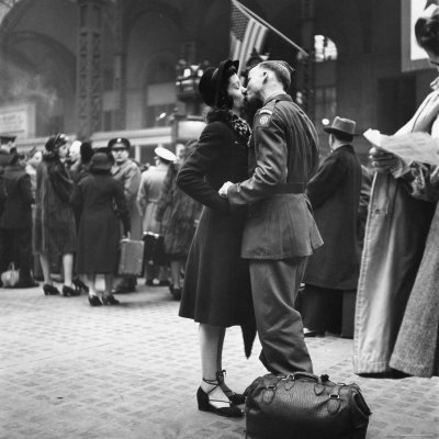 Couple in Penn Station Sharing Farewell Kiss Before He Ships Off to War During WWII by Alfred Eisenstaedt