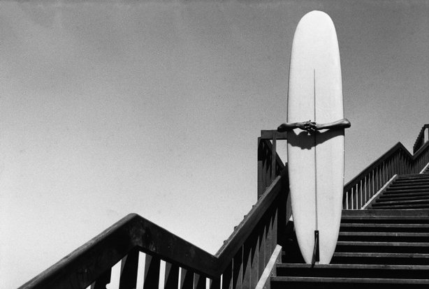 CALIFORNIA—A surfer at Corona del Mar, 1968. © Dennis Stock / Magnum Photos